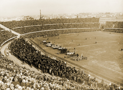 Delegations are seen parading on the pitch during the opening ceremony of the Centenario Stadium, prior to the group match between Uruguay and Peru, in Montevideo.