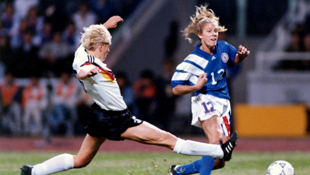 Carin Jennings (right), is seen scoring her side's 0-1 goal, under pressure of Germany's Doris Fitschen.