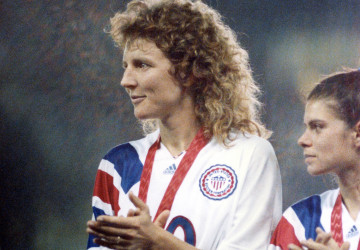 USA players Michelle Akers (right) and Mia Hamm (partly cut) applauding during the trophy ceremony.