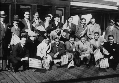 The French team posing for a group pictire with Uruguayan flags before disembarking the SS Conte Verde in Montevideo.