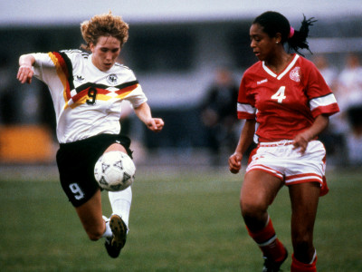 Germany's Heidi Mohr (left) is challenged by danish player Bonny Madsen.